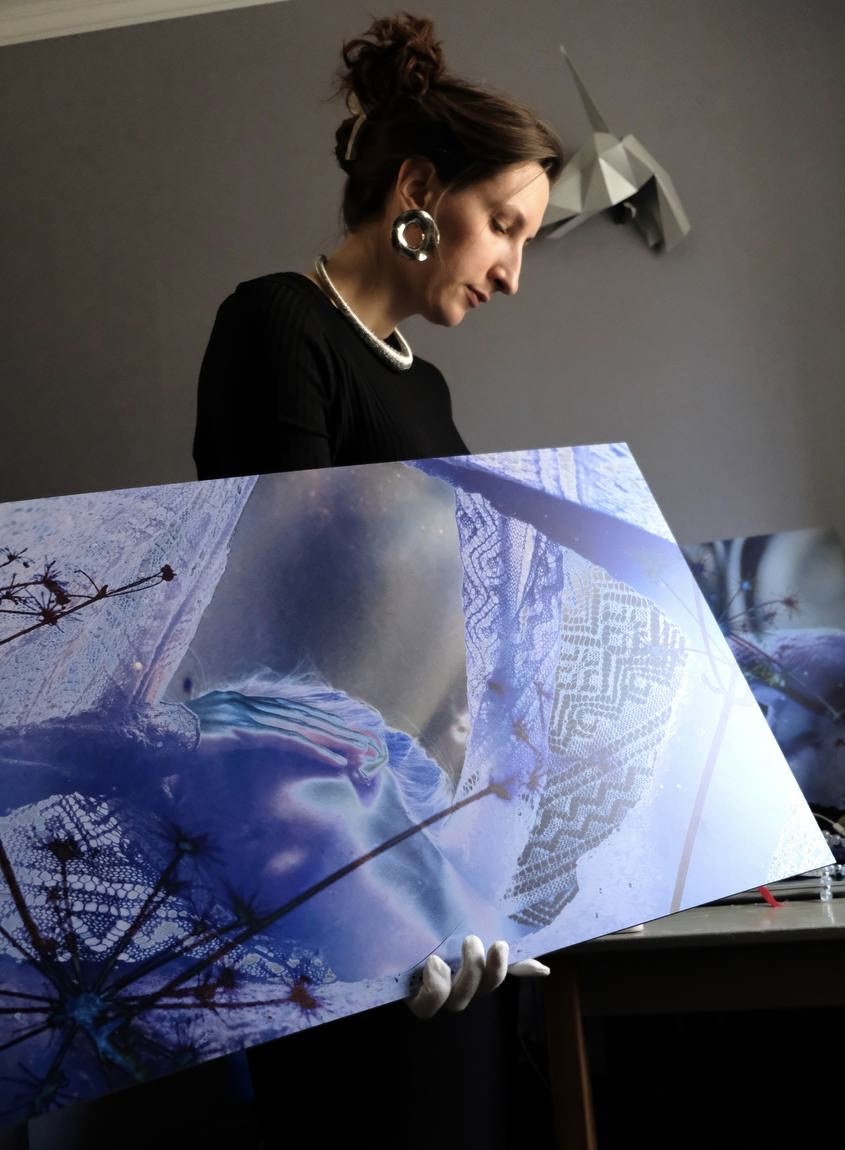 Ksenia Simakova in her studio, working with expanded photography and collage